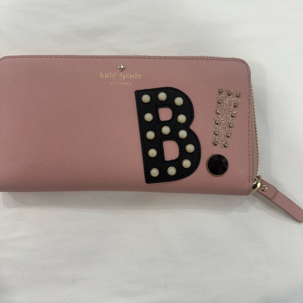 Kate Spade Pink Wallet with Black Embellishments